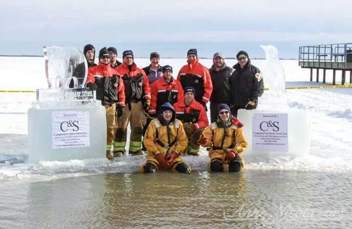 The departments Ice Team poses on the ice